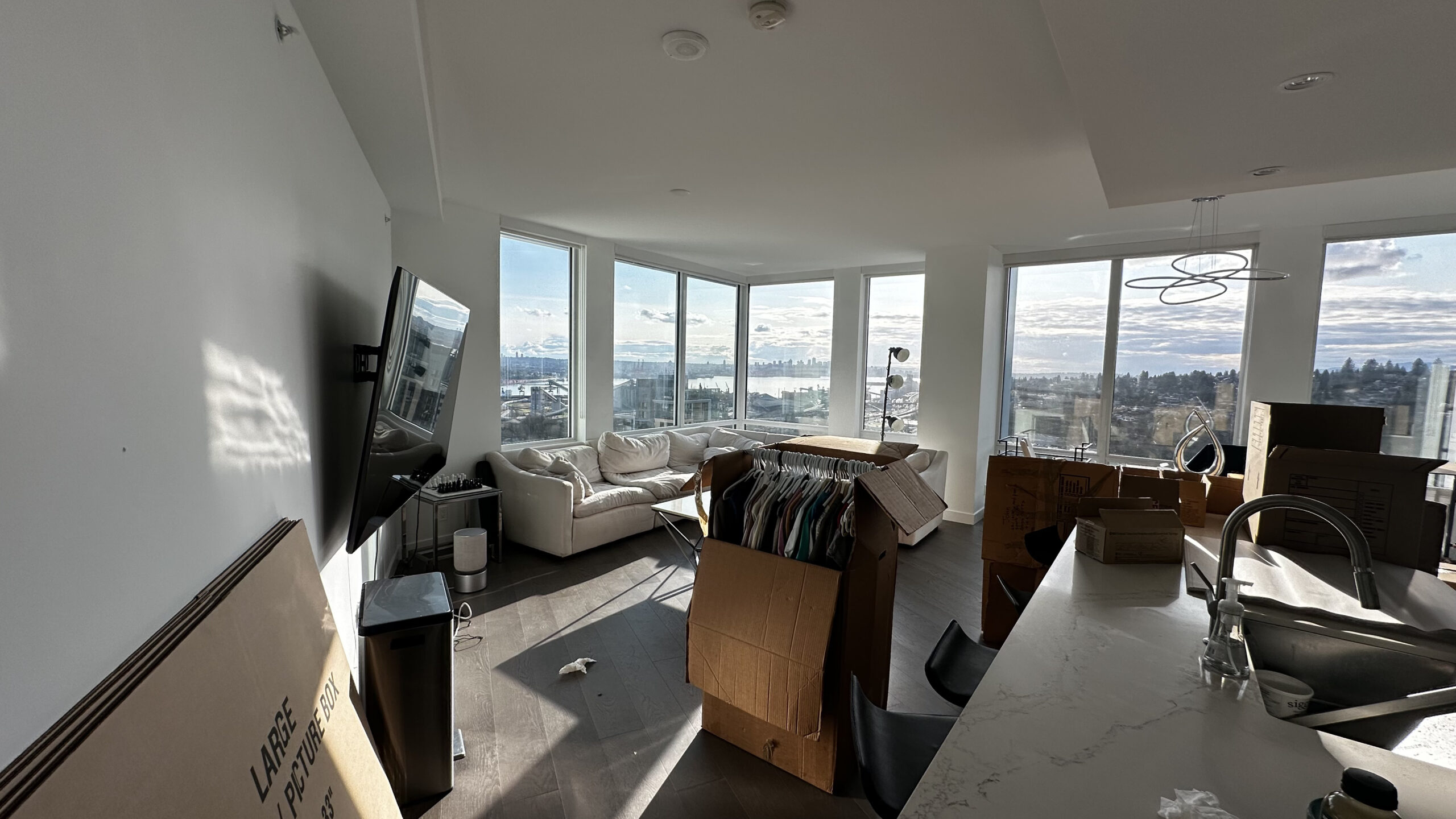 Professional movers packing household belongings for a long-distance move