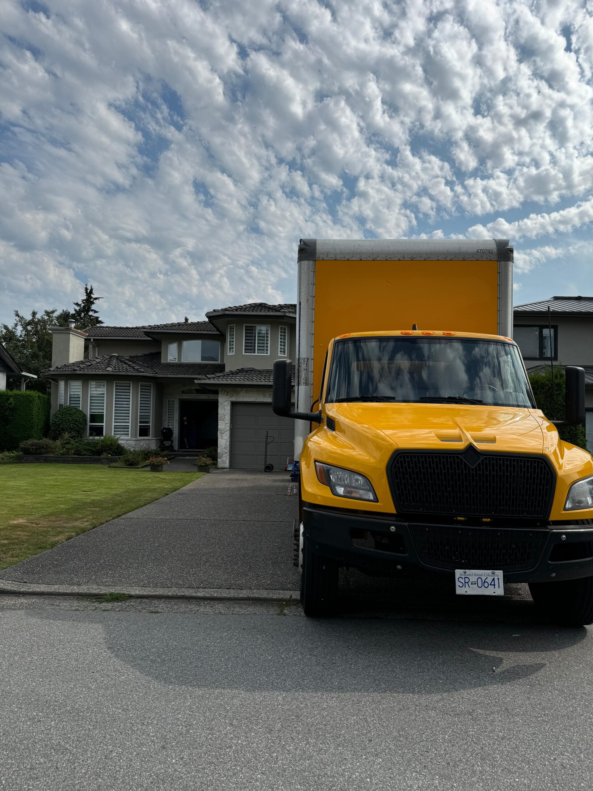 Movers loading furniture for a province to province move